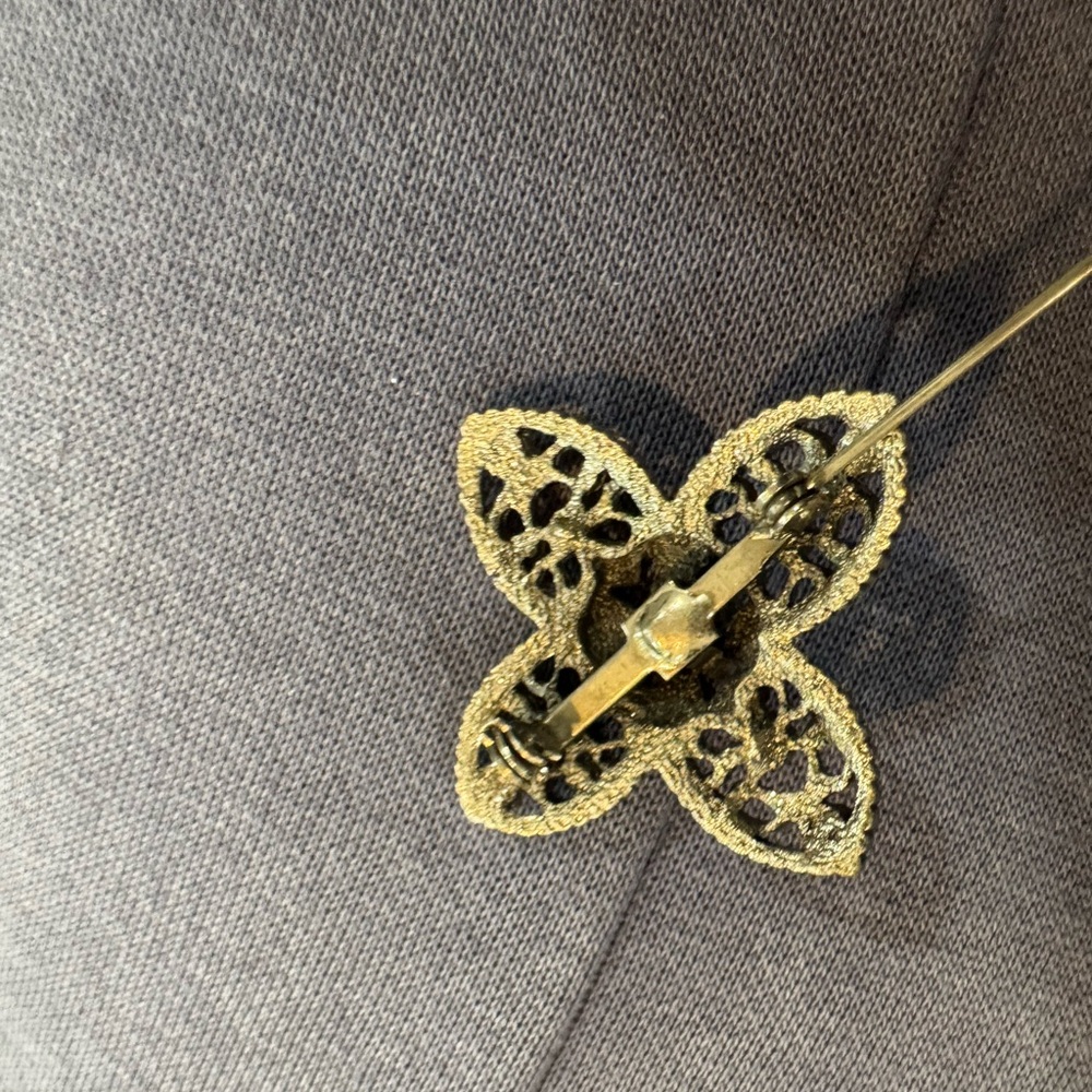 Gold Filigree Brooch on Gray Fabric - Picture 3 of 3